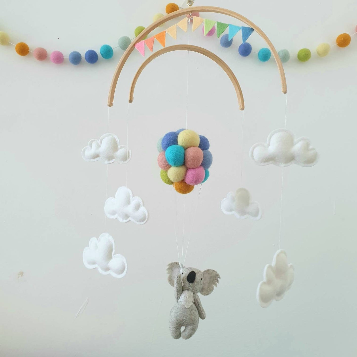 Little Koala holding Pastel Rainbow Balloons