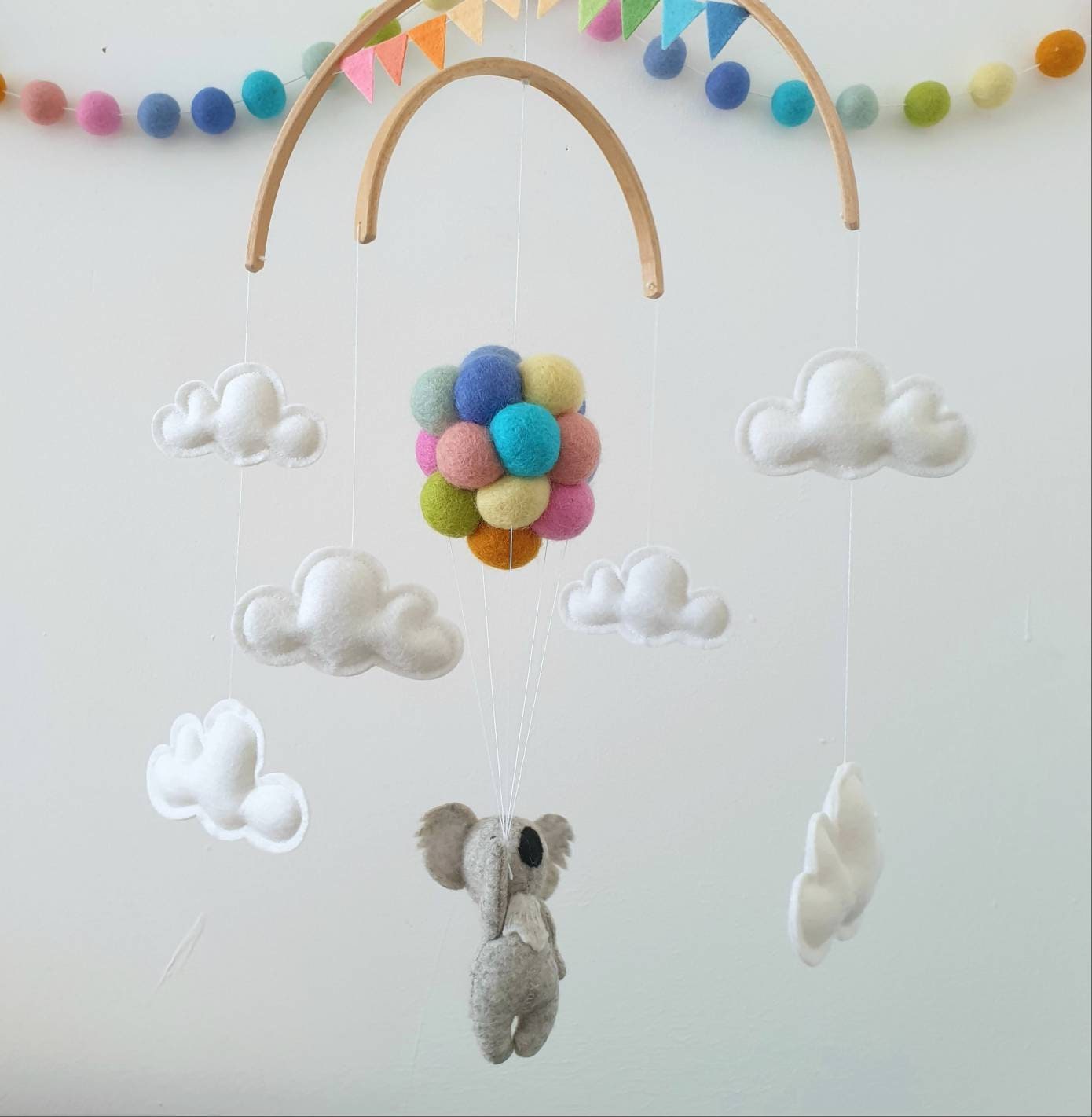Little Koala holding Pastel Rainbow Balloons