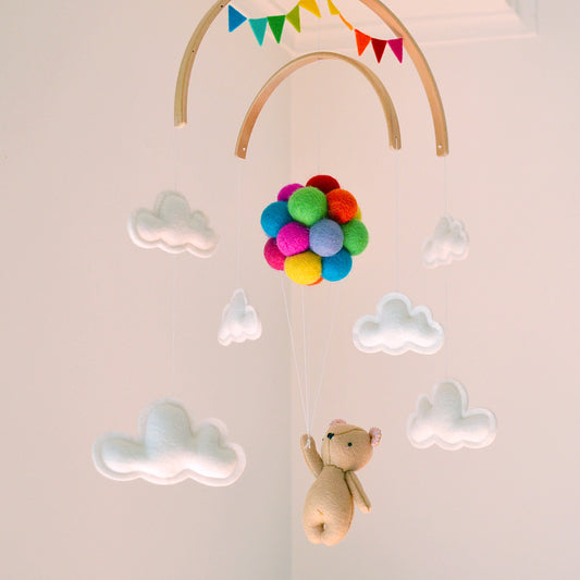 Teddy Bear flying Bright Rainbow Balloons