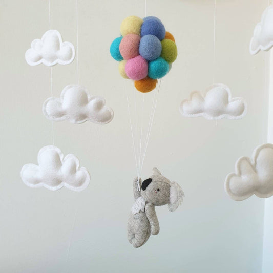 Little Koala holding Pastel  Rainbow Balloons