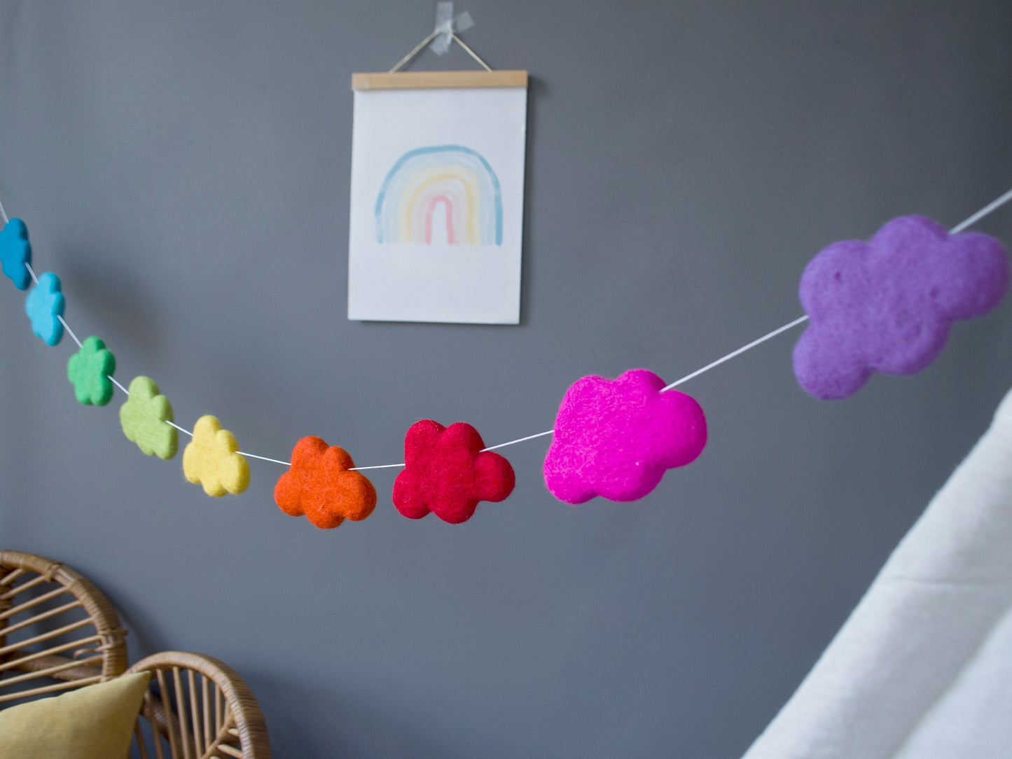 Rainbow garland with clouds in bright colours