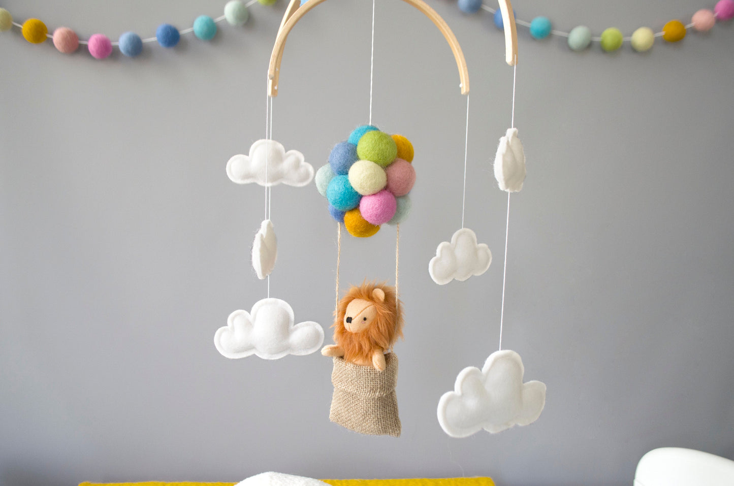 Lion in hot air balloons, pastel rainbow colours