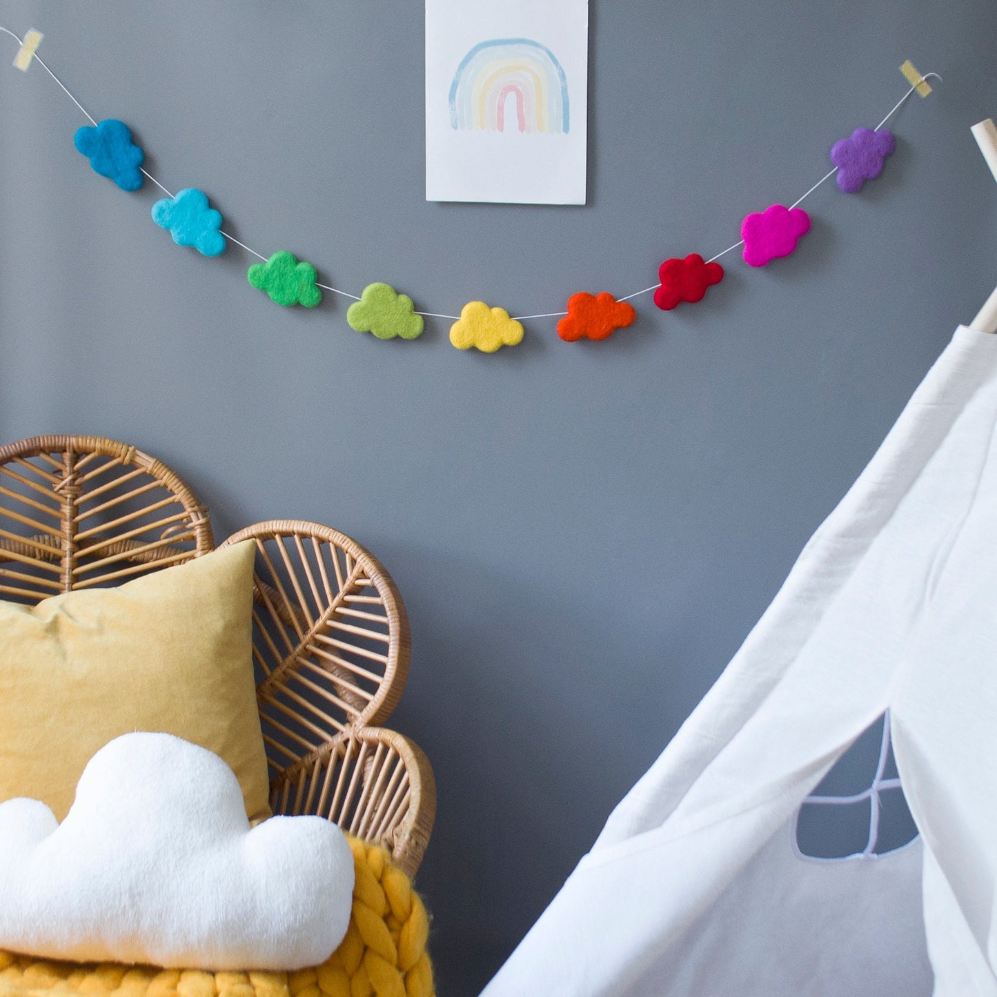Rainbow garland with clouds in bright colours